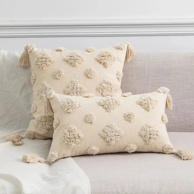Cream-colored rectangular cushion cover with tufted tassels pom-poms and tassels for decorbites boho style living room decor