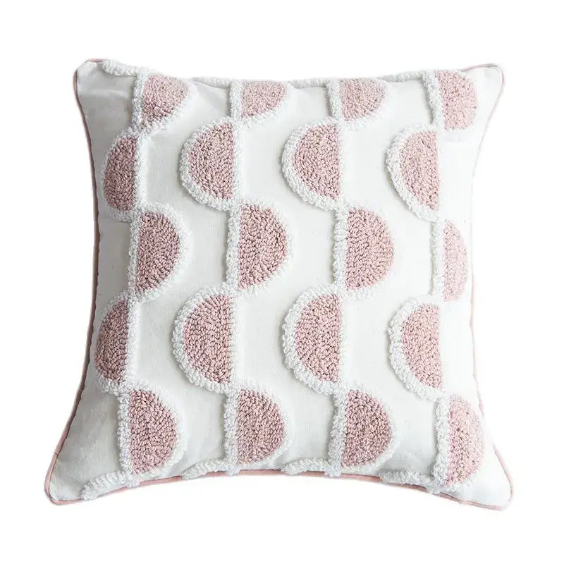 Soft white cotton loop tufted cushion cover with blush pink circular tufts arranged in vertical rows for living room decorbites decor