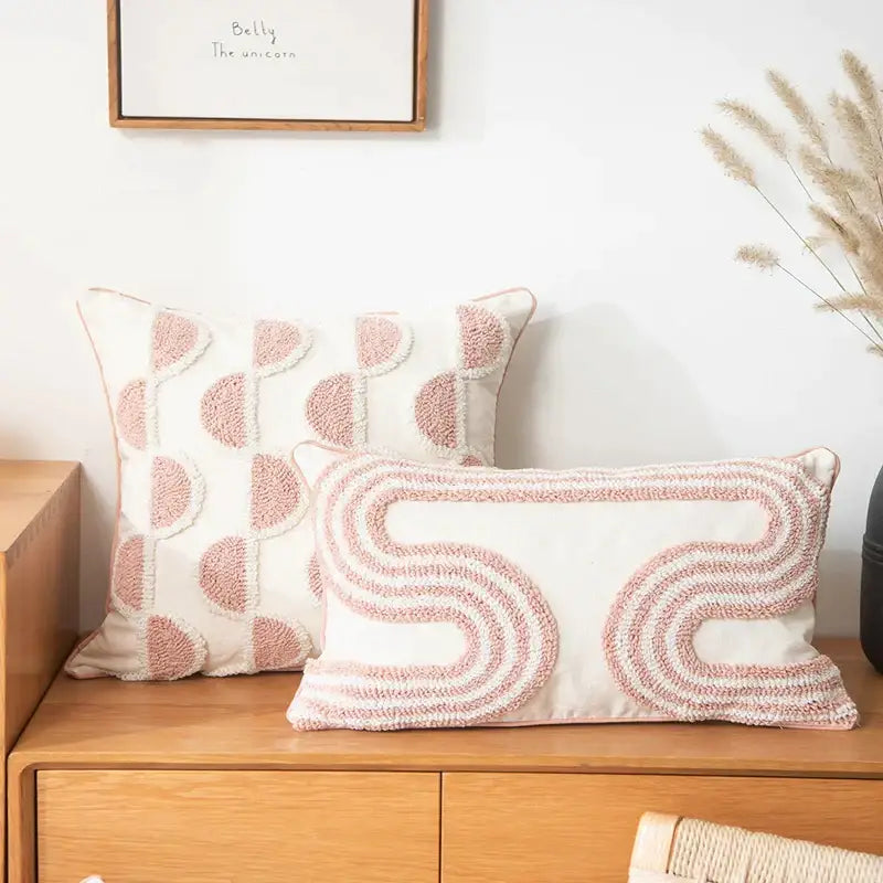 Two rectangular throw pillows with blush pink and cream cotton loop tufted cushion covers for living room decorbites decor