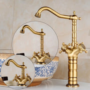 Tuqiu brass-finished vintage-style single hole deck mounted kitchen faucet with ornate cross handles and curved spout