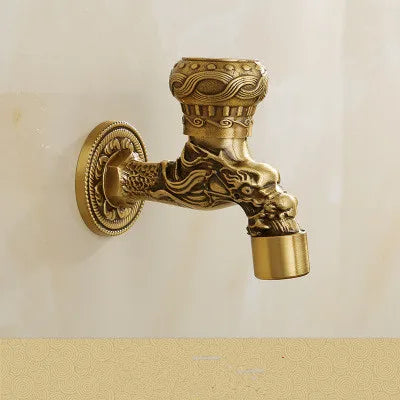 Golden brass washing machine faucet with ornate antique dragon head design for outdoor garden use