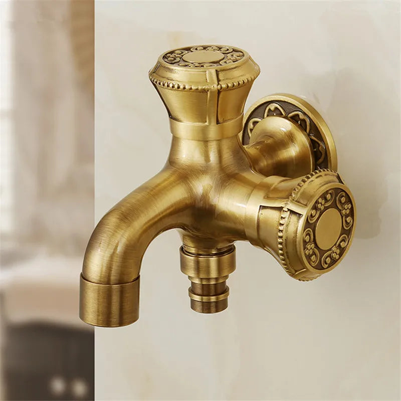 Antique brass finished tuqiu washing machine faucet with ornate floral detailing on handles and spout for outdoor use