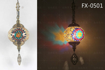 Mosaic glass pendant light with starburst design, multicolored and gold accents.
