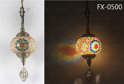 Mosaic pendant light with star design, multicolored glass beads, brass accents.