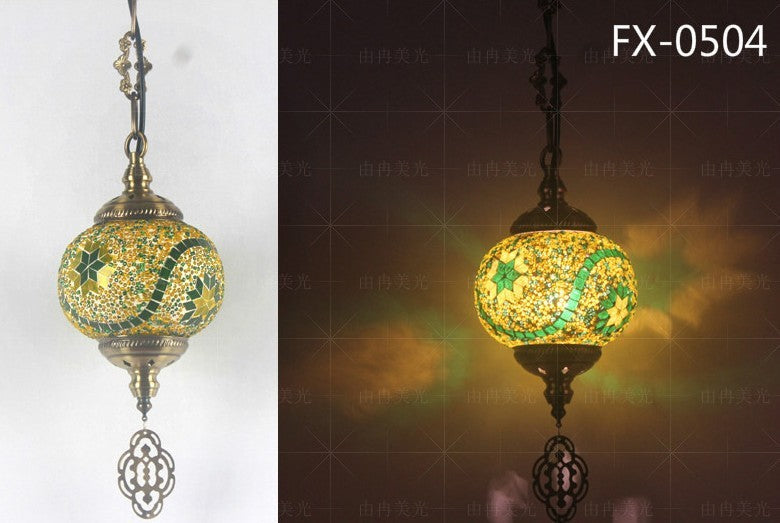 Mosaic glass globe pendant light with intricate patterns and a bronze frame.