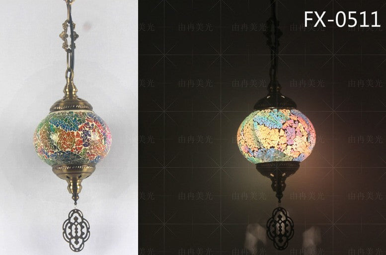 Mosaic globe pendant light with colorful glass tiles and ornate metal accents.