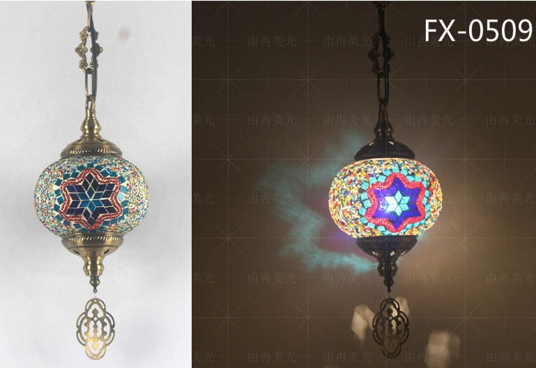 Mosaic glass pendant light with star design, multicolored and bronze accents.