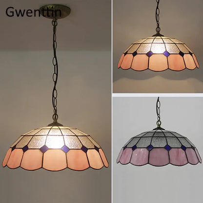 Turquoise and purple diamond square stained glass pendant light with warm amber hexagonal and petal panels