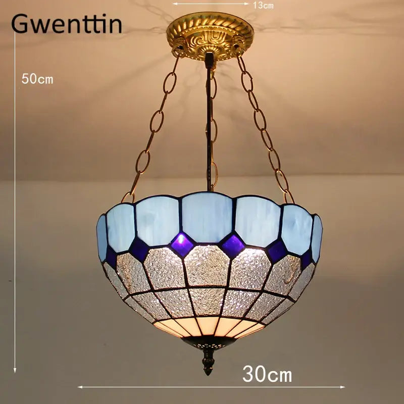 Gwenttin pendant light with turquoise and purple diamond square stained glass shade in octagonal pattern