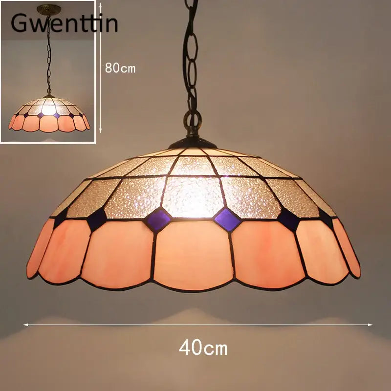 Turquoise and purple diamond square stained glass pendant light with scalloped peach and amber hues for kitchen use