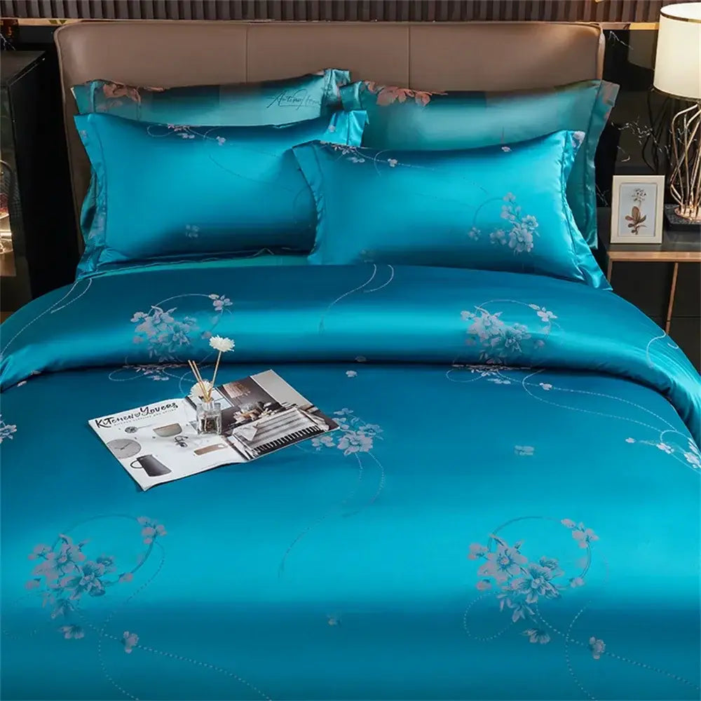 Turquoise blue satin jacquard bedding set with delicate white floral embroidery for elegant bedroom decorbites decor