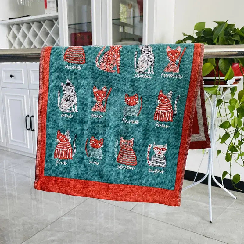 Teal and orange embroidered cotton gauze hand and face towel with numbered cats grid for bathroom decorbites cotton gauze
