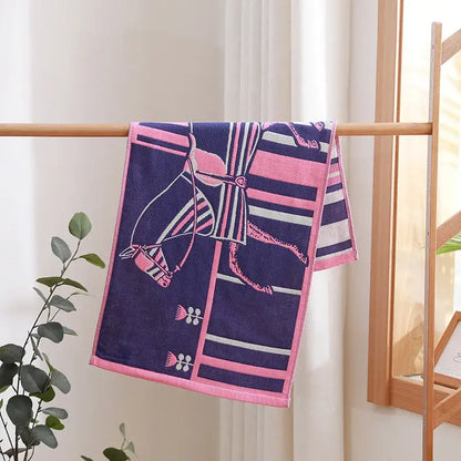 Navy blue and pink decorbites cotton gauze hand and face towel with horse design and decorative bows for bathroom use