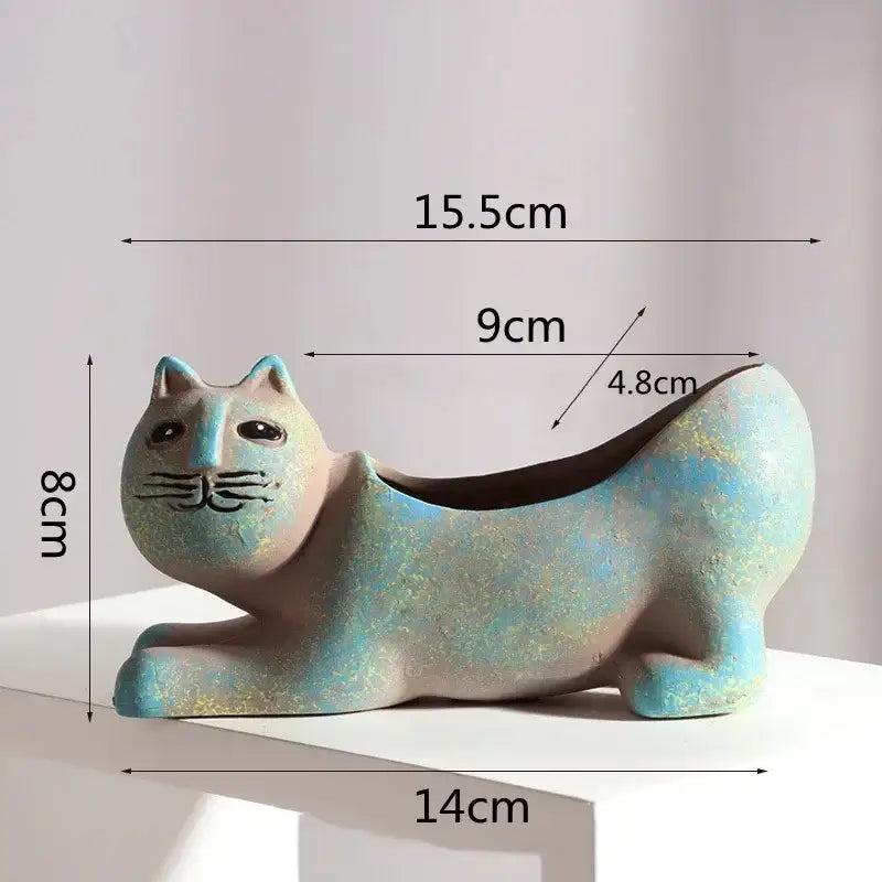 Turquoise ceramic cat succulent plant pot with textured light blue and beige glaze for living room decor