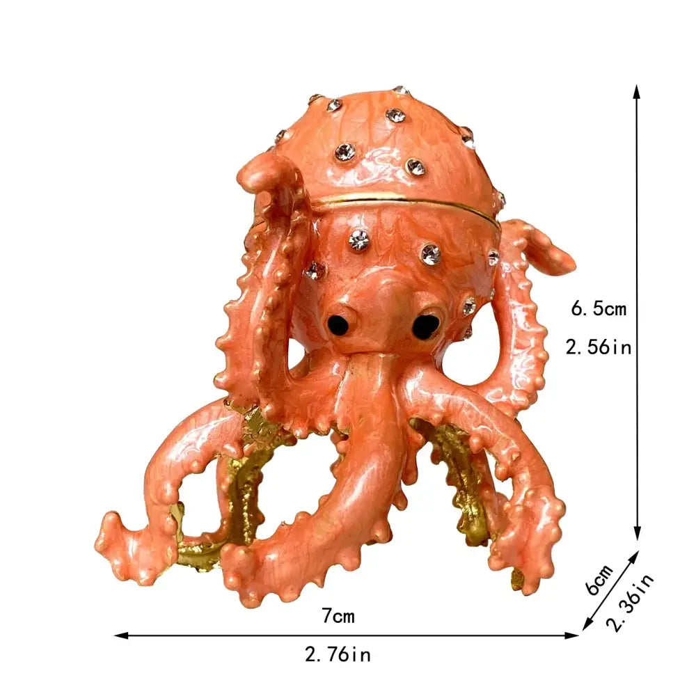 Coral-colored octopus-shaped trinket box with sparkling rhinestones and gold accents as decorbites crystal animal figurines