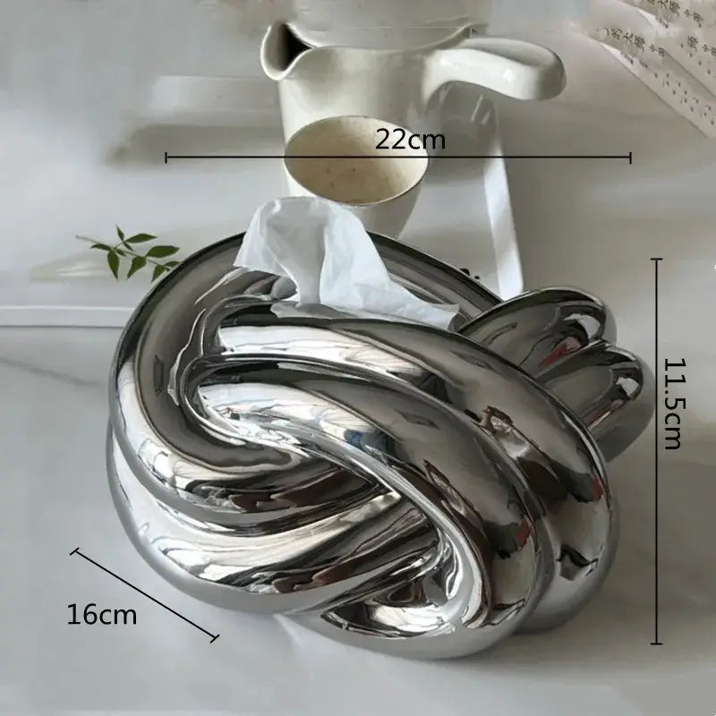 Shiny silver ceramic desktop storage paper tissue box holder in a twisted knot design for living room decorbites ceramic desktop