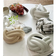 Cream-colored decorbites ceramic desktop storage tissue box with twisted knot design for living room desktop storage paper