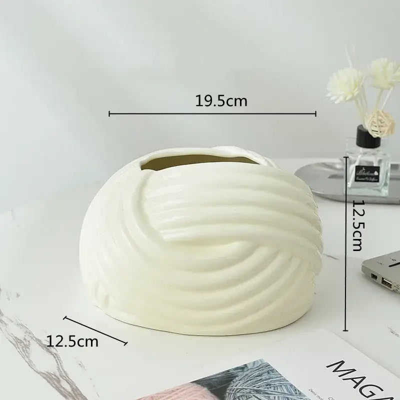 Cream-colored ceramic desktop storage tissue box with smooth glossy finish and concentric ridges for decorbites ceramic desktop use