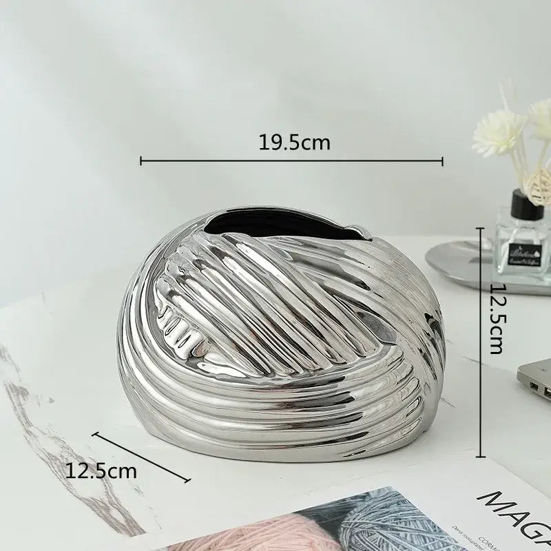 Shiny silver ceramic desktop storage vase with textured twisted design and open top for decorbites ceramic desktop use