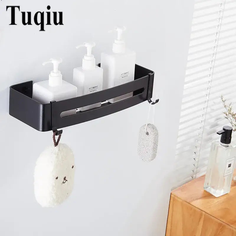 Two tier black aluminum bathroom corner shelf with hooks holding soap dispensers and bath sponges decorbites black aluminum