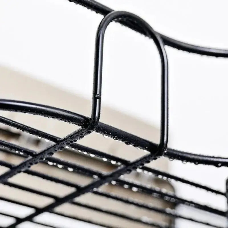 Two tier black metal corner storage shelves with grid pattern and water droplets for bathroom storage decorbites corner bathroom