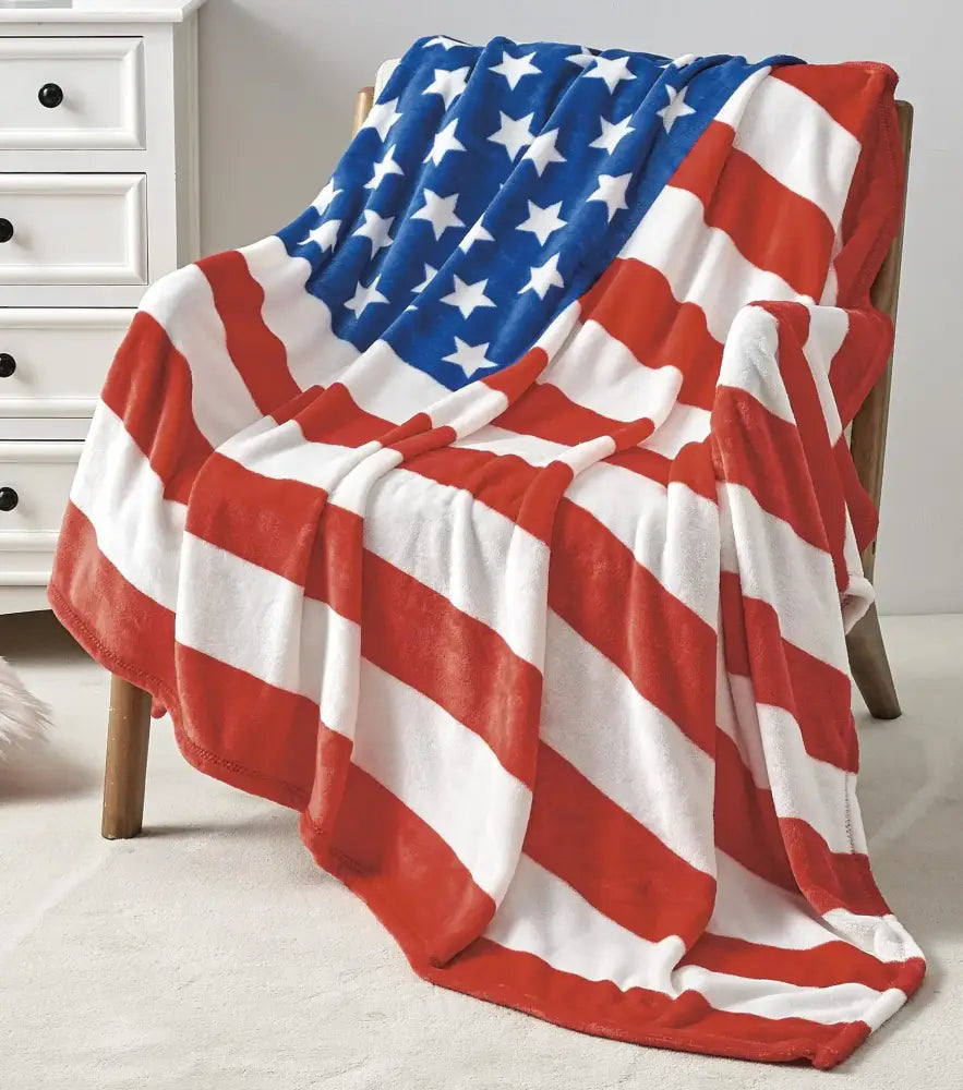A decorbites cozy flannel throw blanket with an american flag design in red white and navy for living room decor