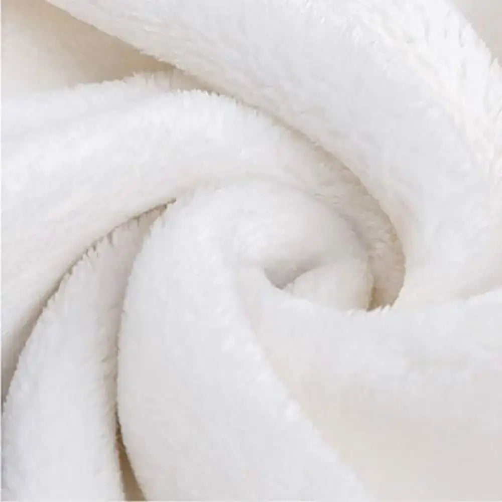 Soft white plush throw blanket with a cozy textured surface from decorbites cozy flannel for living room decor