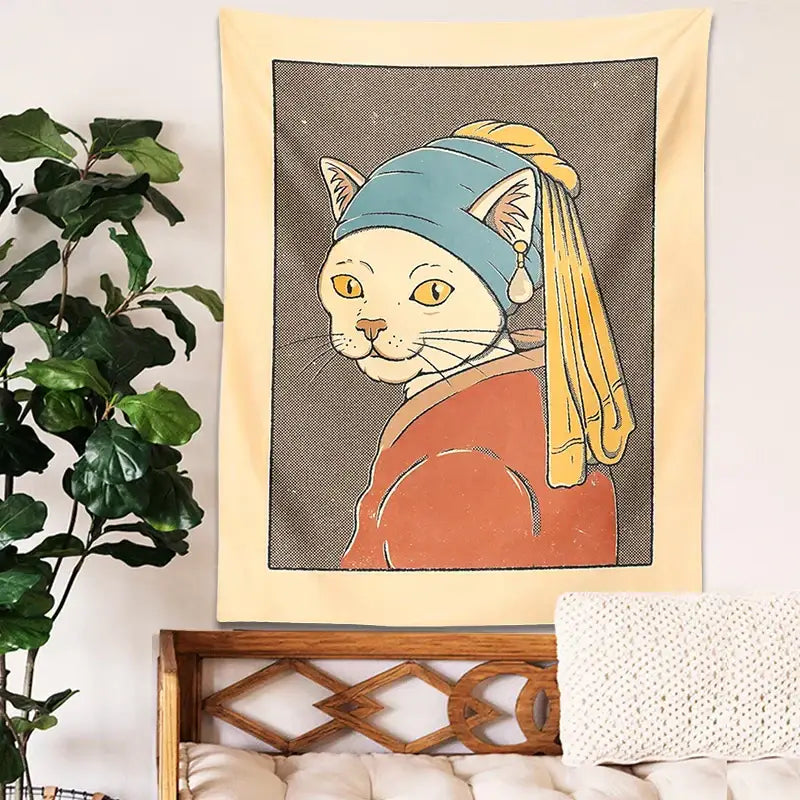 Beige pearl earring metal wall hanging featuring a stylized cat in blue headscarf and orange garment for bedroom art