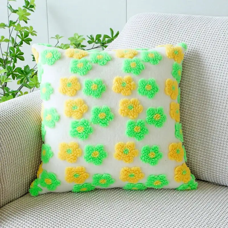 A cozy white pillow case with vibrant decorbites 3d floral jacquard pattern of raised green and yellow flowers
