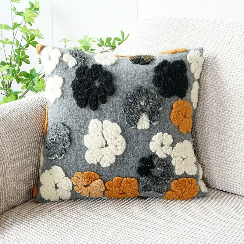 Gray felt floral jacquard pillow case with vibrant black white and burnt orange 3d flowers decorbites 3d floral design