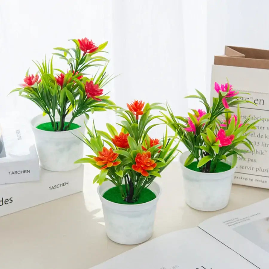 Three artificial flowers bonsai vases with vibrant red and pink blooms in white ceramic pots for decorbites artificial flowers decor