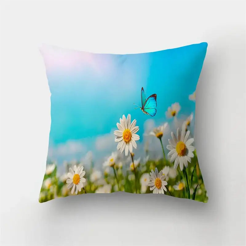 Square butterfly flower pillow case with vibrant white daisies yellow centers and blue butterfly on turquoise sky for decorbites