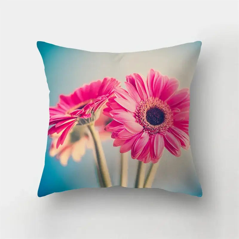 Square flower pillow case featuring vibrant pink gerbera daisy print with soft blue and beige decorbites butterfly flower design
