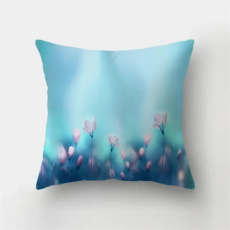 Vibrant butterfly flower pillow case featuring soft-focus pink flowers on a gradient blue background for living room decorbites butterfly flower decor