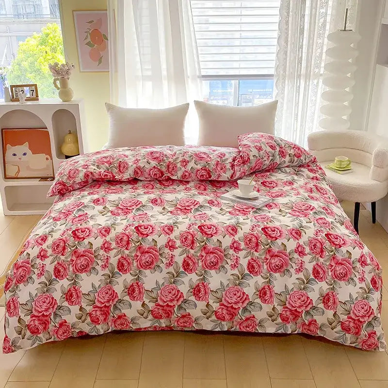 A cozy bedding set with a vibrant red rose floral duvet cover and soft white pillows for stylish bedroom decorbites decor