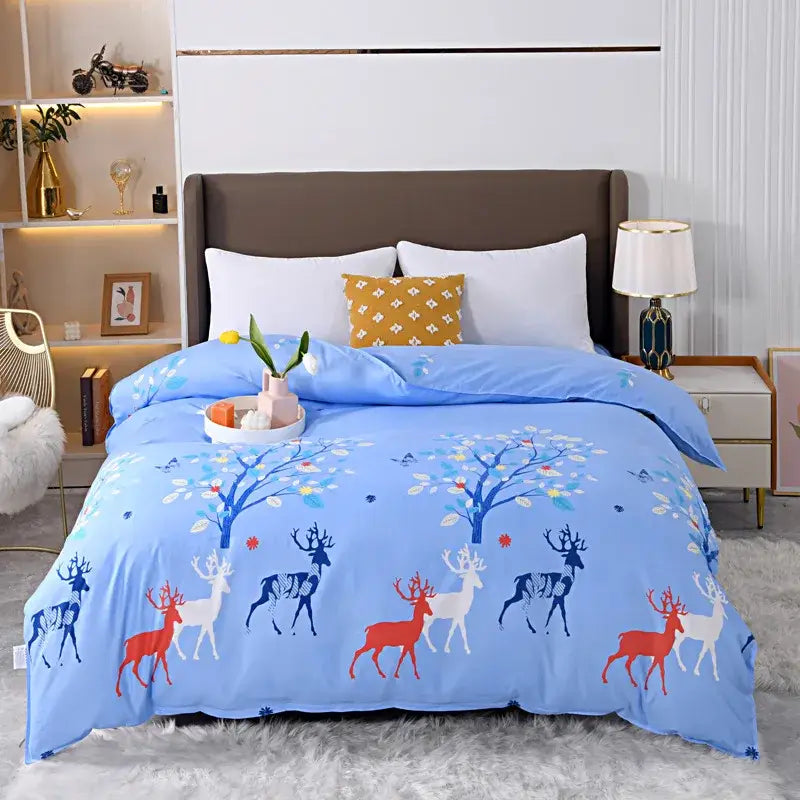 Light blue duvet cover bedding set with playful red white and navy deer and colorful floral leaf decorbites leopard print design