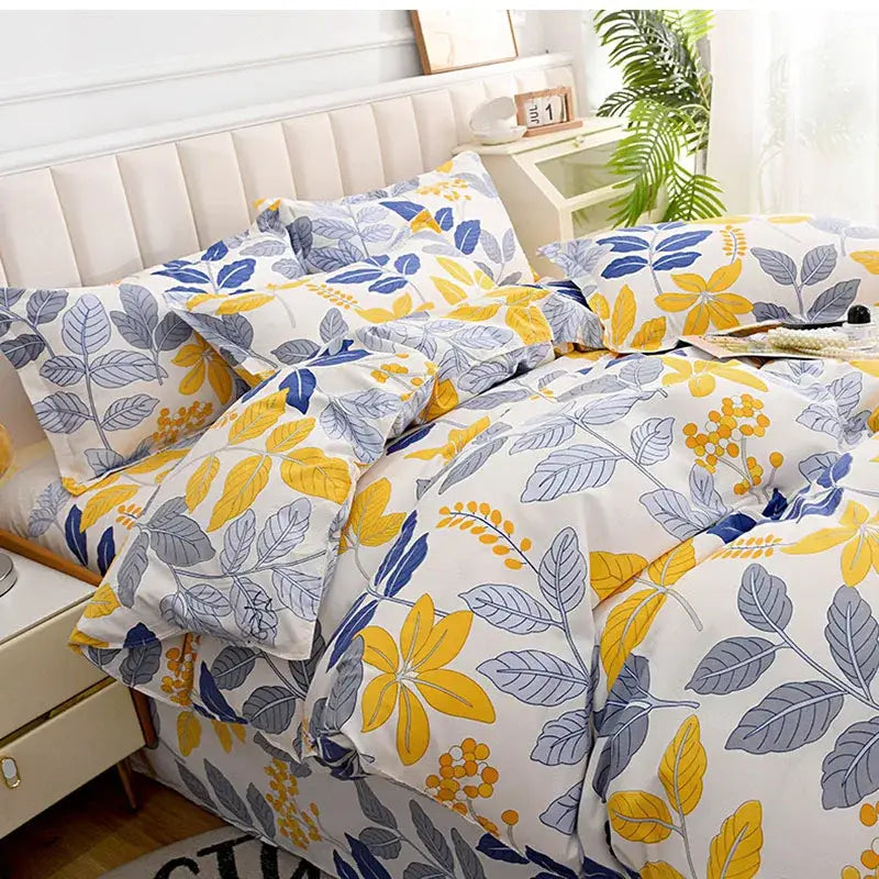 Yellow and blue leaf-patterned duvet cover bedding set with white background vibrant floral design for bedroom decor