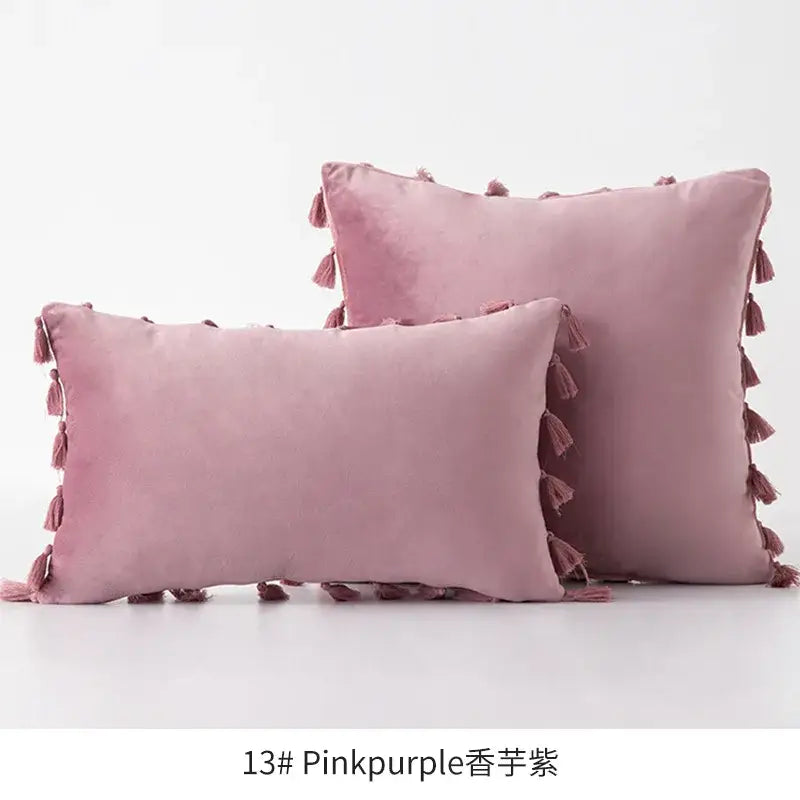 Soft pink-purple velvet pillow with decorative fringed tassel edges for living room decor by decorbites tassel velvet