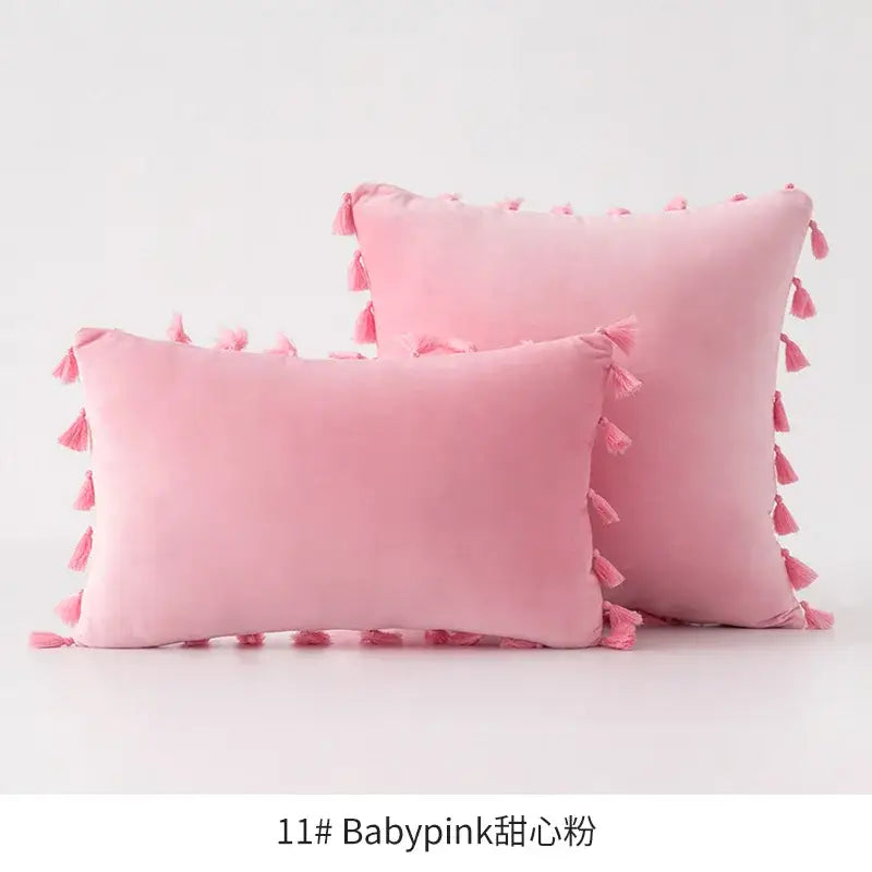 Soft baby pink velvet pillows featuring delicate fringed tassel edges for vibrant tassel velvet living room decorbites decor