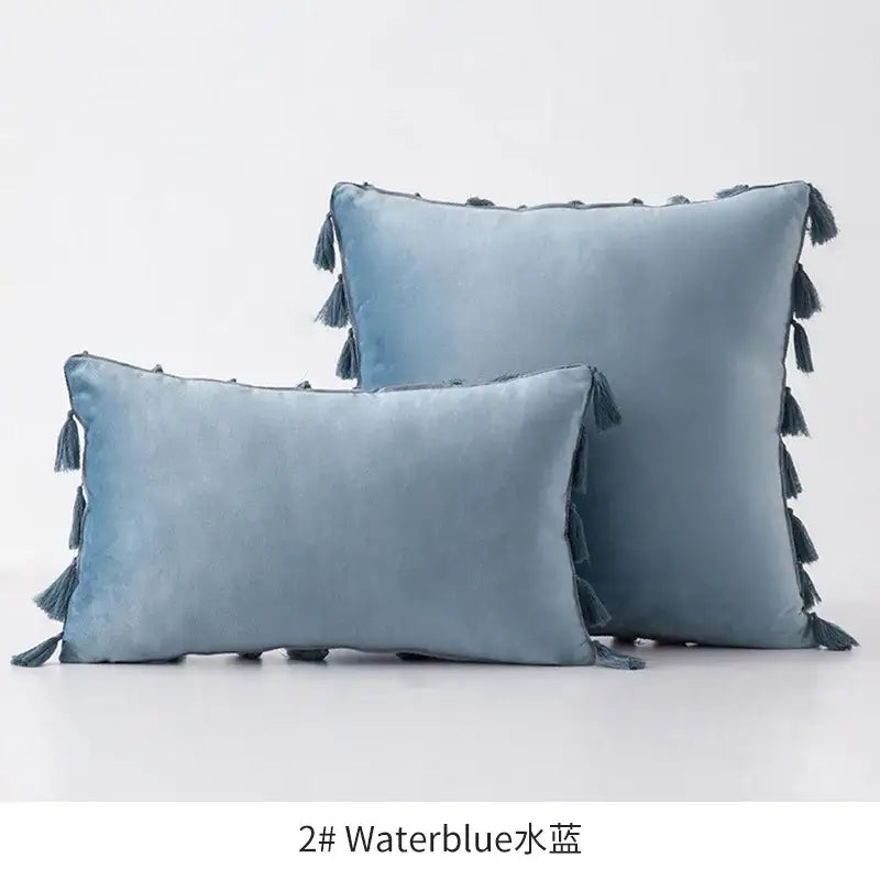 Soft waterblue velvet throw pillows with fringed tassel velvet edges for living room decor by decorbites tassel velvet