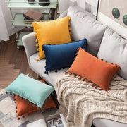 Vibrant fringed tassel velvet throw pillows in yellow blue orange and mint green for living room decorbites tassel velvet decor