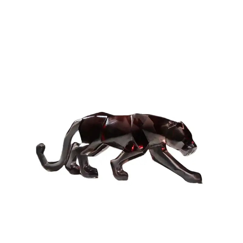 A sleek dark red geometric panther figurine with glossy finish featured in vibrant glitter animal sculptures leopard cheetah decor