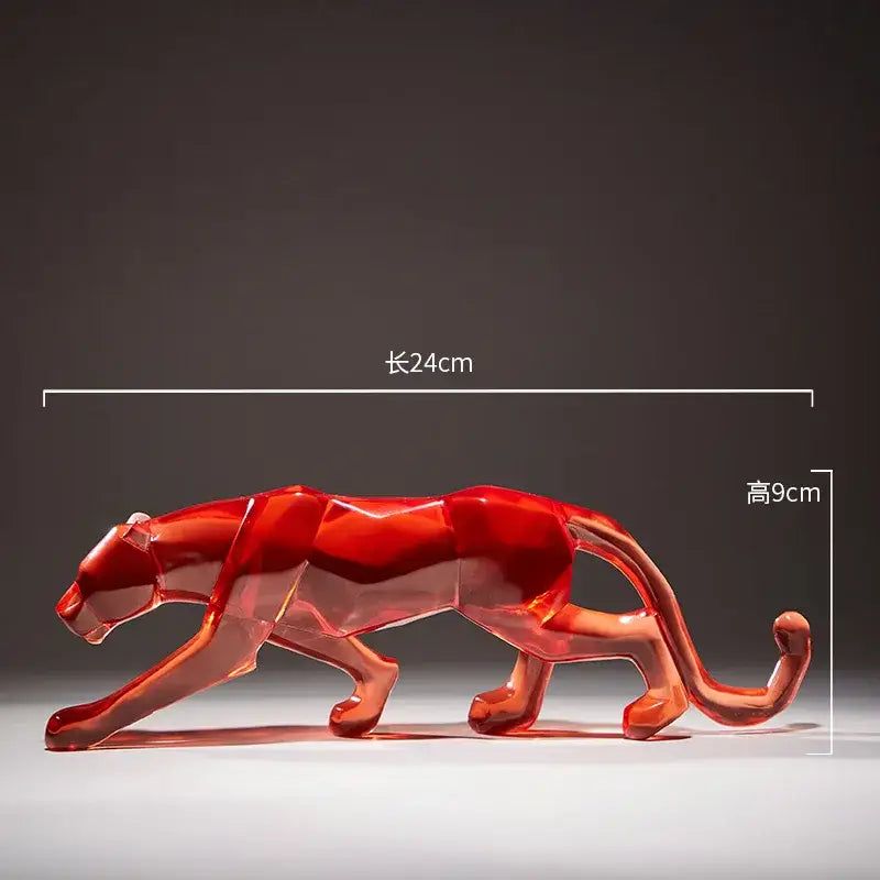 A translucent red glass panther figurine with a sleek geometric design for decorbites leopard cheetah animal sculptures