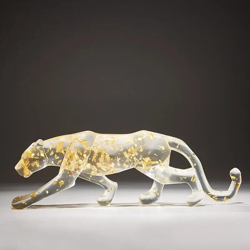 Transparent resin leopard cheetah animal sculpture with gold leaf detailing for vibrant living room decorbites leopard cheetah decor