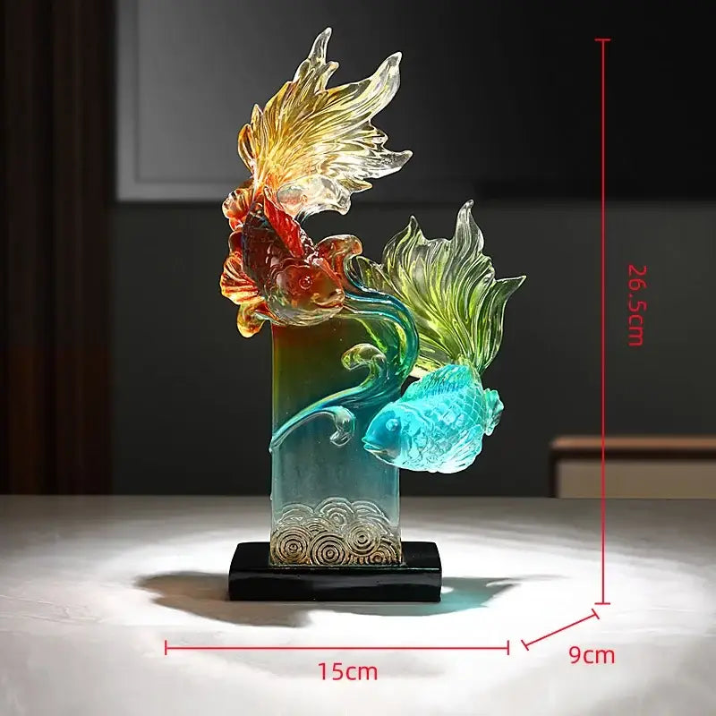 Vibrant gradient goldfish resin sculpture featuring translucent goldfish in flowing poses for living room decor by decorbites