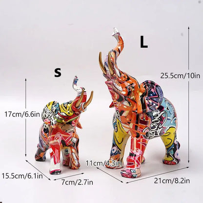 Vibrant graffiti elephant resin sculpture with bold orange yellow accents and intricate black white patterns for decorbites