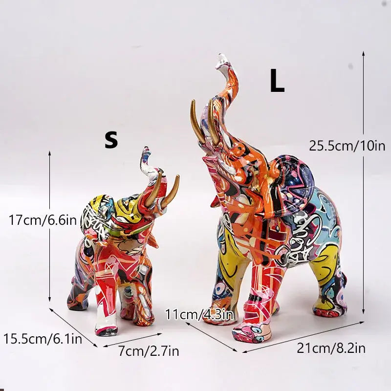 Vibrant graffiti elephant resin sculpture with bold orange yellow accents and intricate black white patterns for decorbites