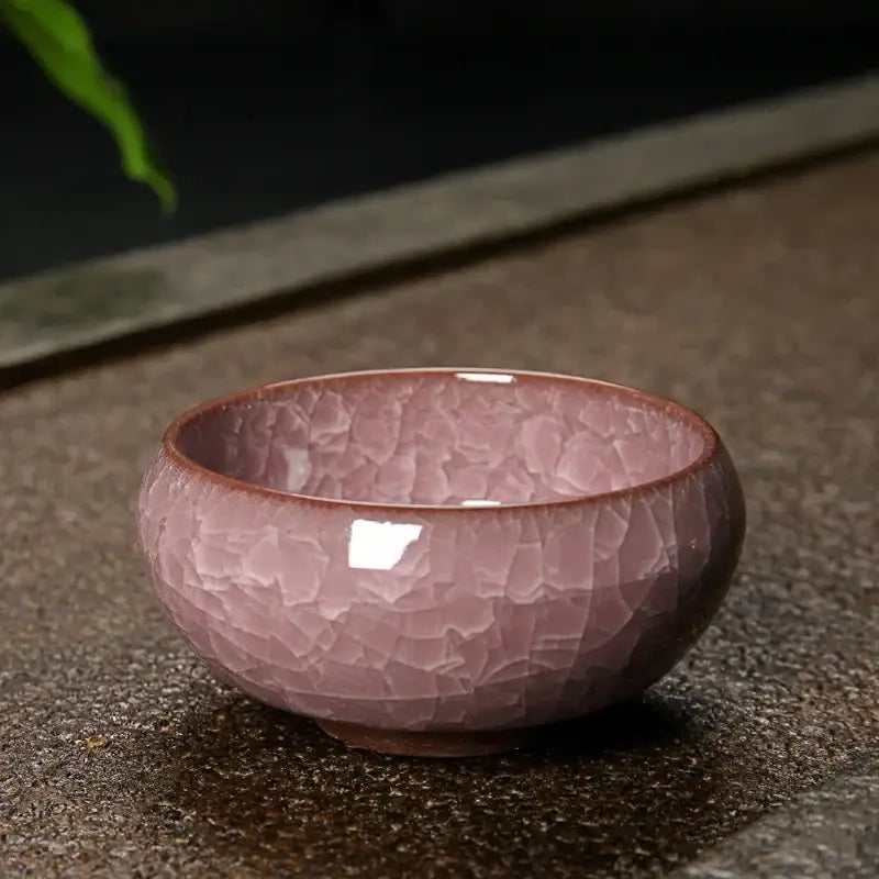 A delicate pink ice cracking ceramic tea bowl with crackled glaze finish for decorbites ice cracking kitchen decor