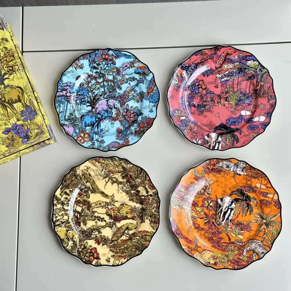 Set of four vibrant scalloped-edge jungle flower bone dining plates set in turquoise pink mustard yellow and orange colors