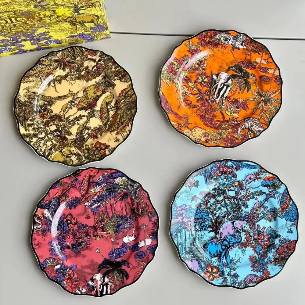 Four vibrant jungle flower bone dining plates set with scalloped edges featuring elephants and tropical flora decorbites jungle flower